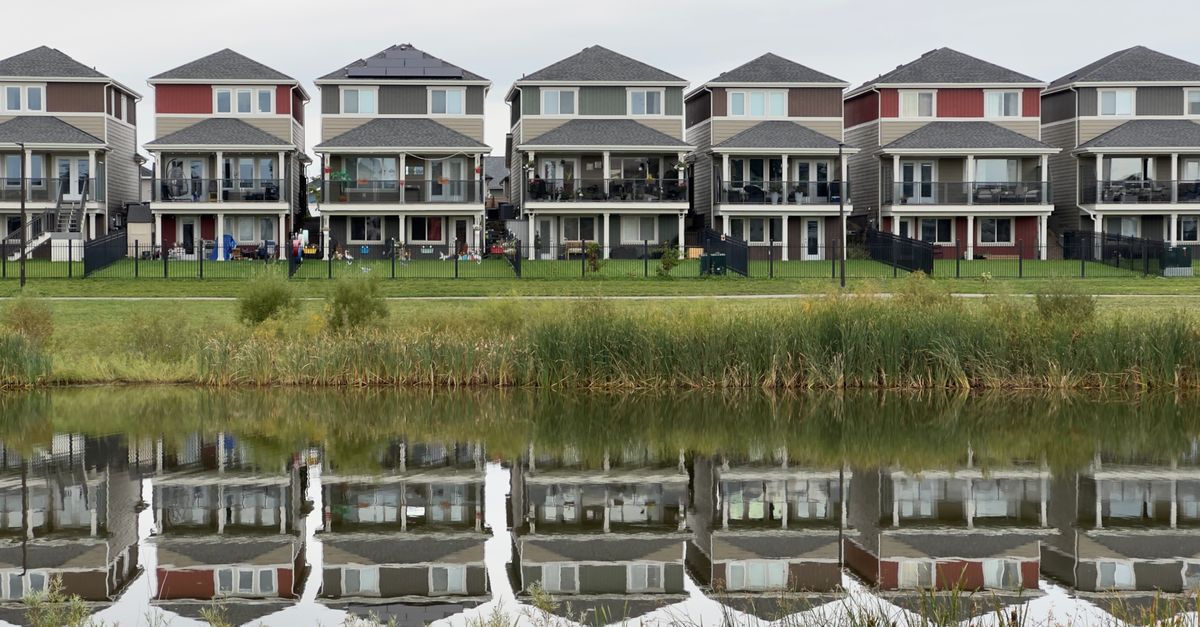 A row of colorful neighborhood houses, each carrying its own numerological vibration