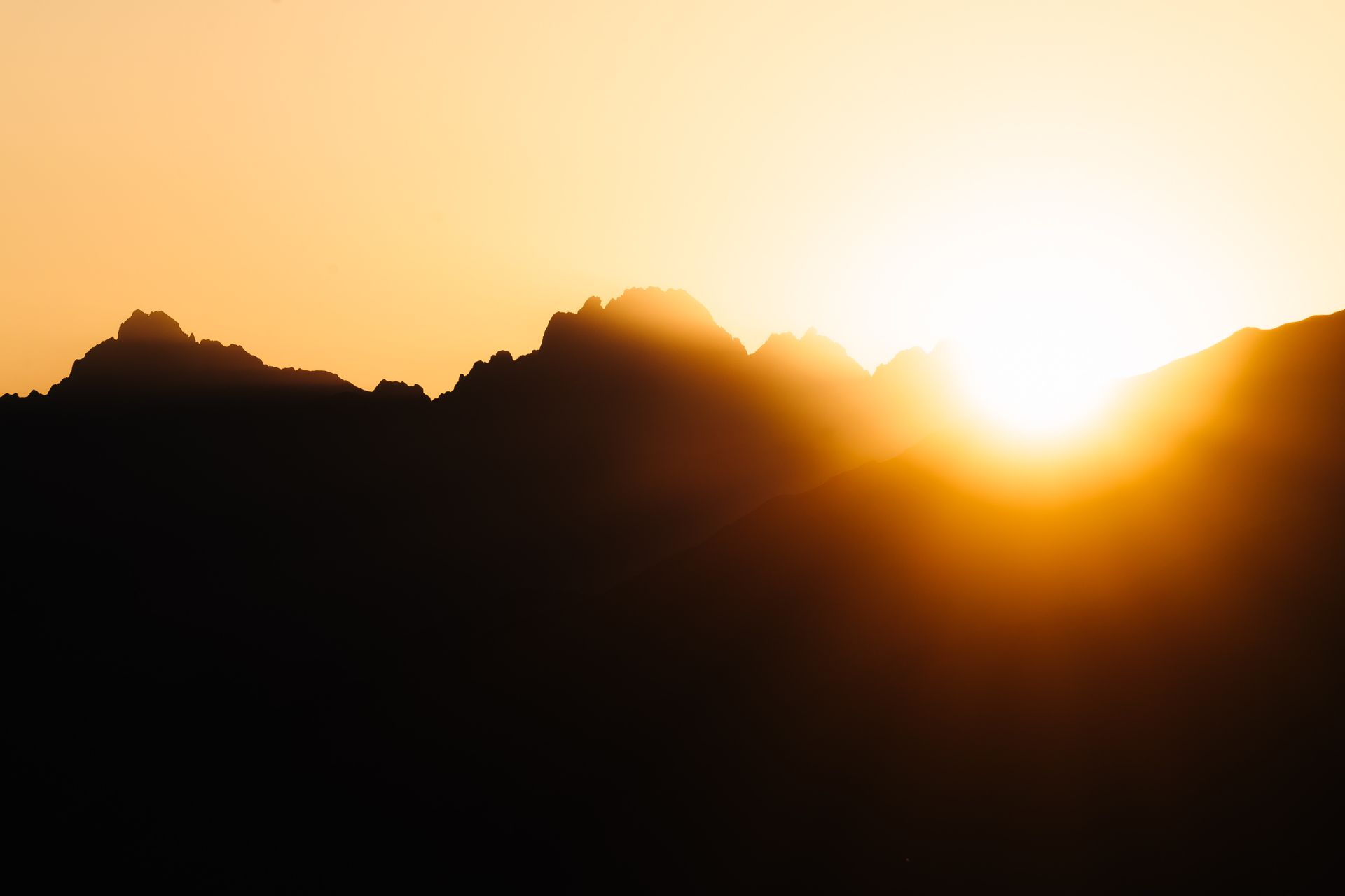 Sun rising over misty mountains, representing the new beginnings tied to angel number 1111