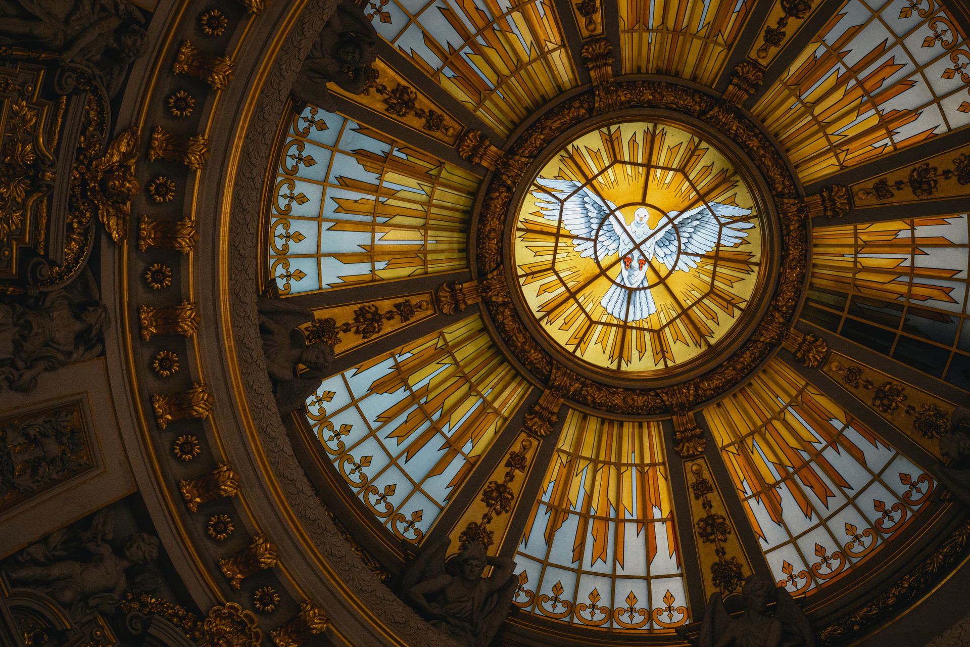 An ornate cathedral dome with a radiant dove at its center surrounded by golden light, representing the spiritual wisdom of the number seven in angel number 777