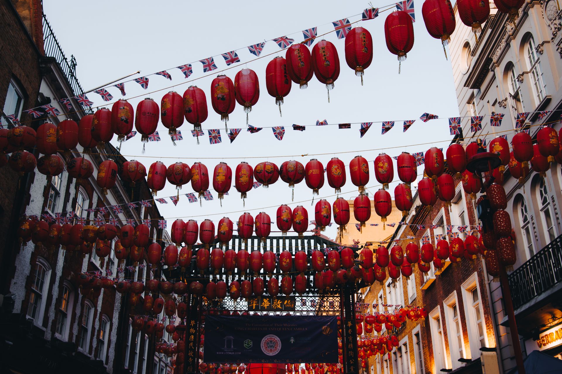 Red Chinese lanterns and decorations representing the long tradition of Chinese astrology