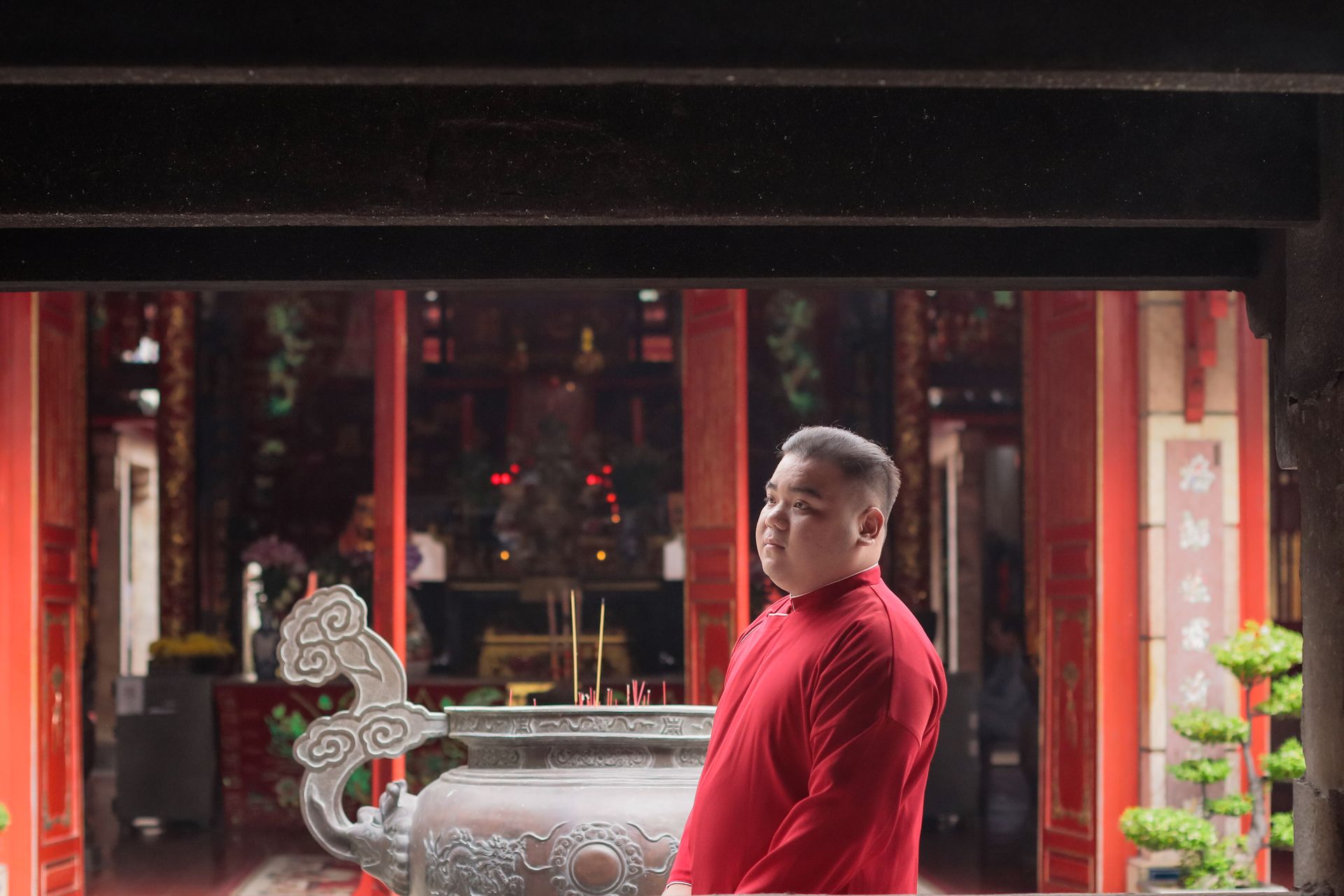Incense smoke rising in a quiet temple, evoking the reflective practice behind Chinese astrology