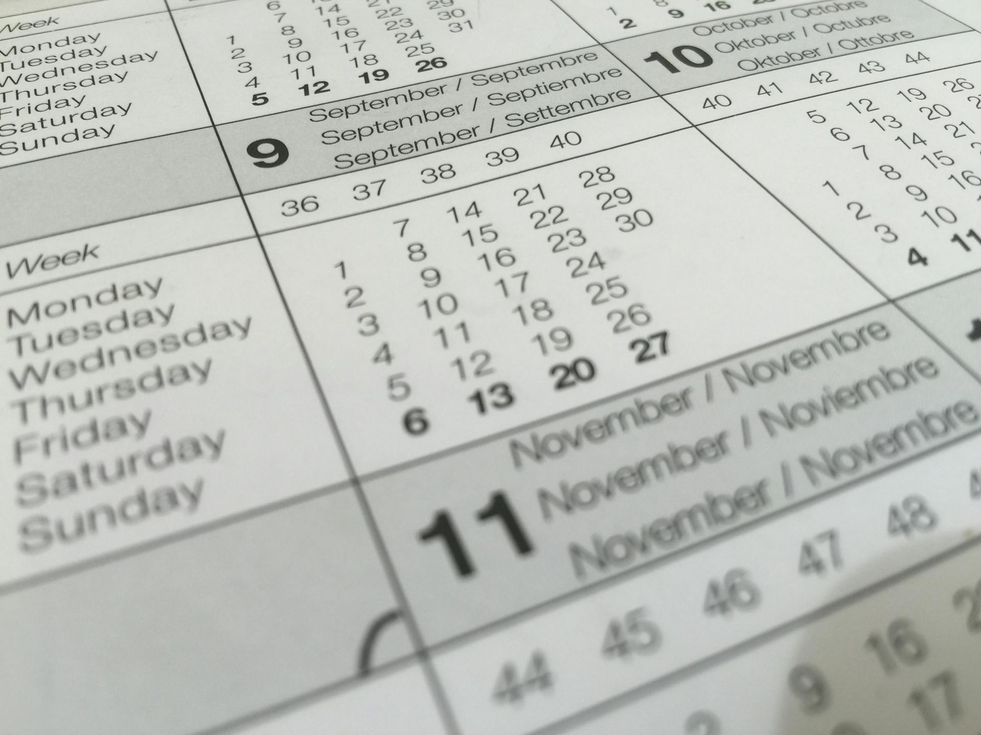A monthly calendar page with dates highlighted, representing the birthday number in numerology drawn from the day you were born