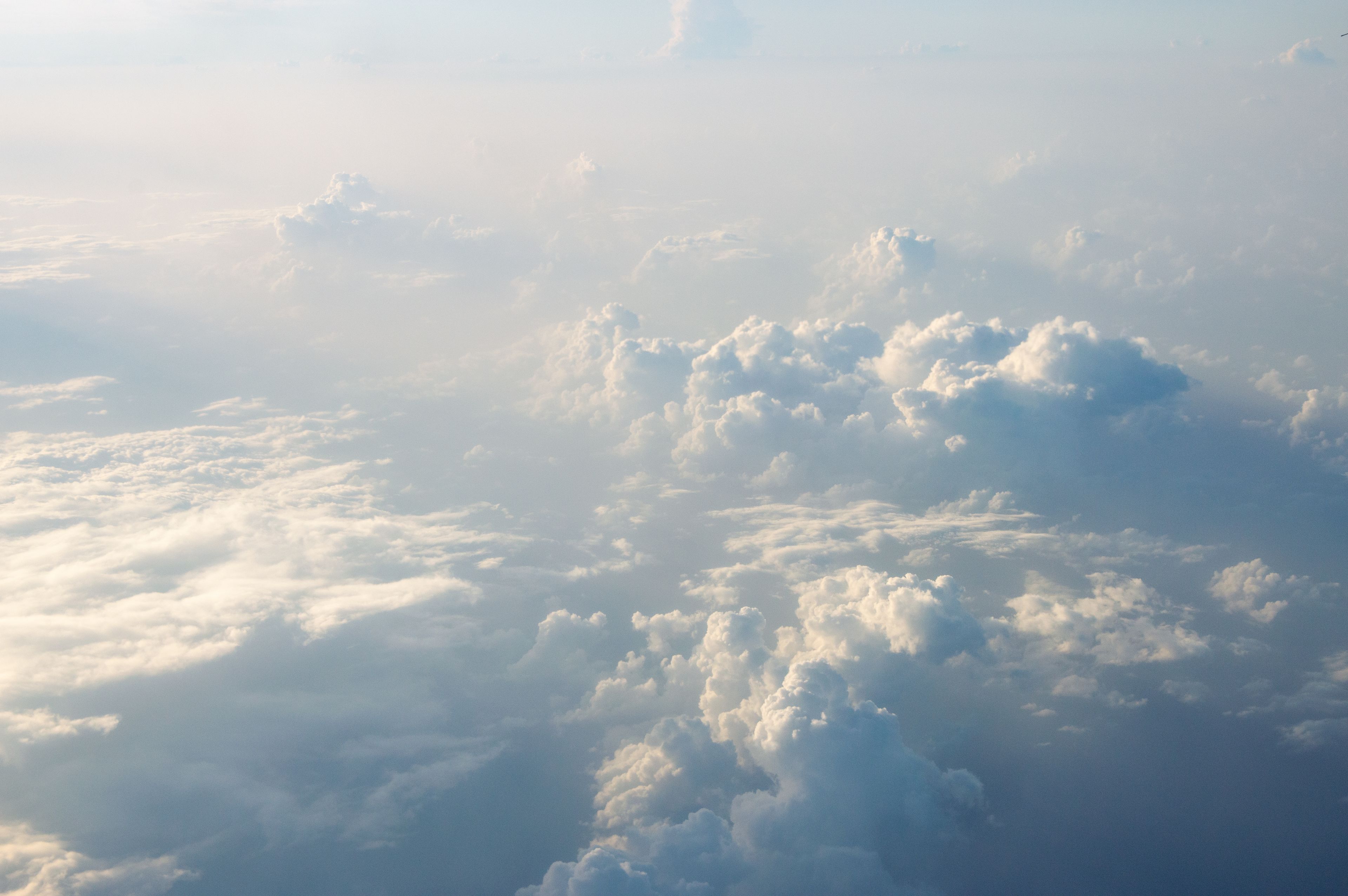 Soft surreal clouds drifting through a dreamlike sky, representing the fluid, shifting landscape of a lucid dream