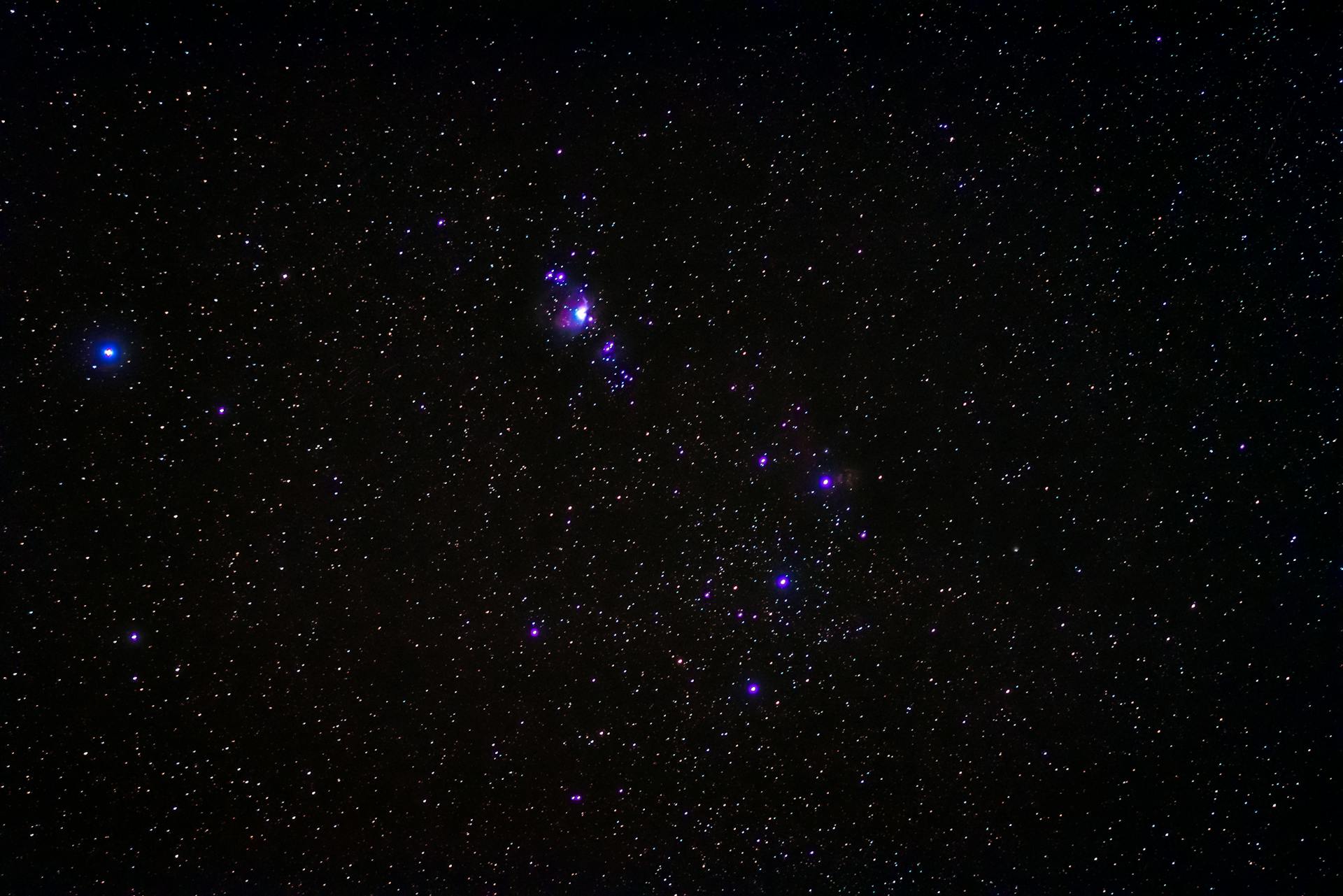 Night sky filled with stars and constellations representing the cosmic framework of astrological houses