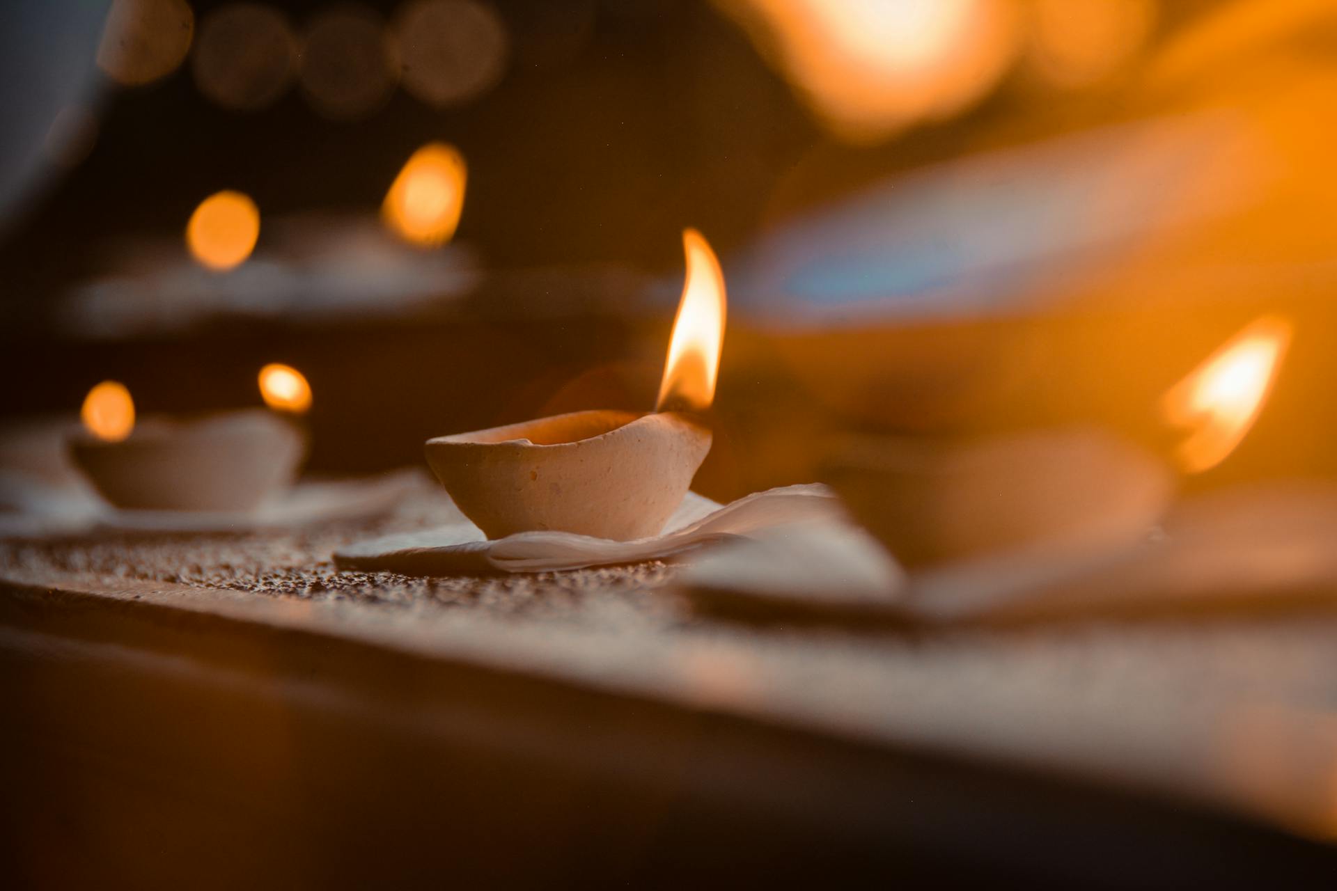 Warm candlelight creating an intimate atmosphere for reflection and ritual