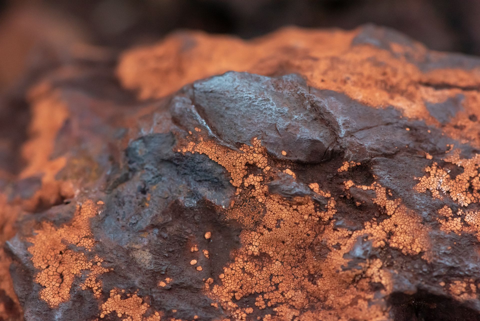 Close-up of iron ore, the iron oxide from which hematite forms, showing what hematite is made of