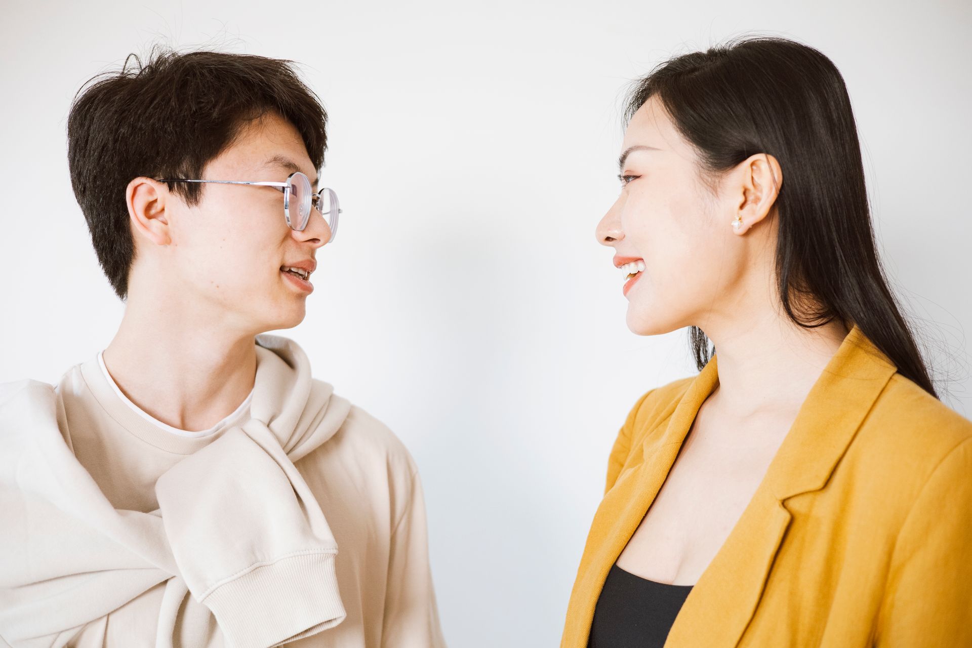 A couple in close conversation, representing the verbal, mental chemistry that drives air Mars signs
