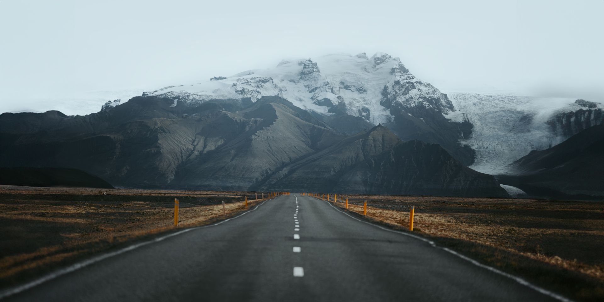 An open road stretching toward distant hills, symbolizing the Sagittarius love of freedom and the journey ahead