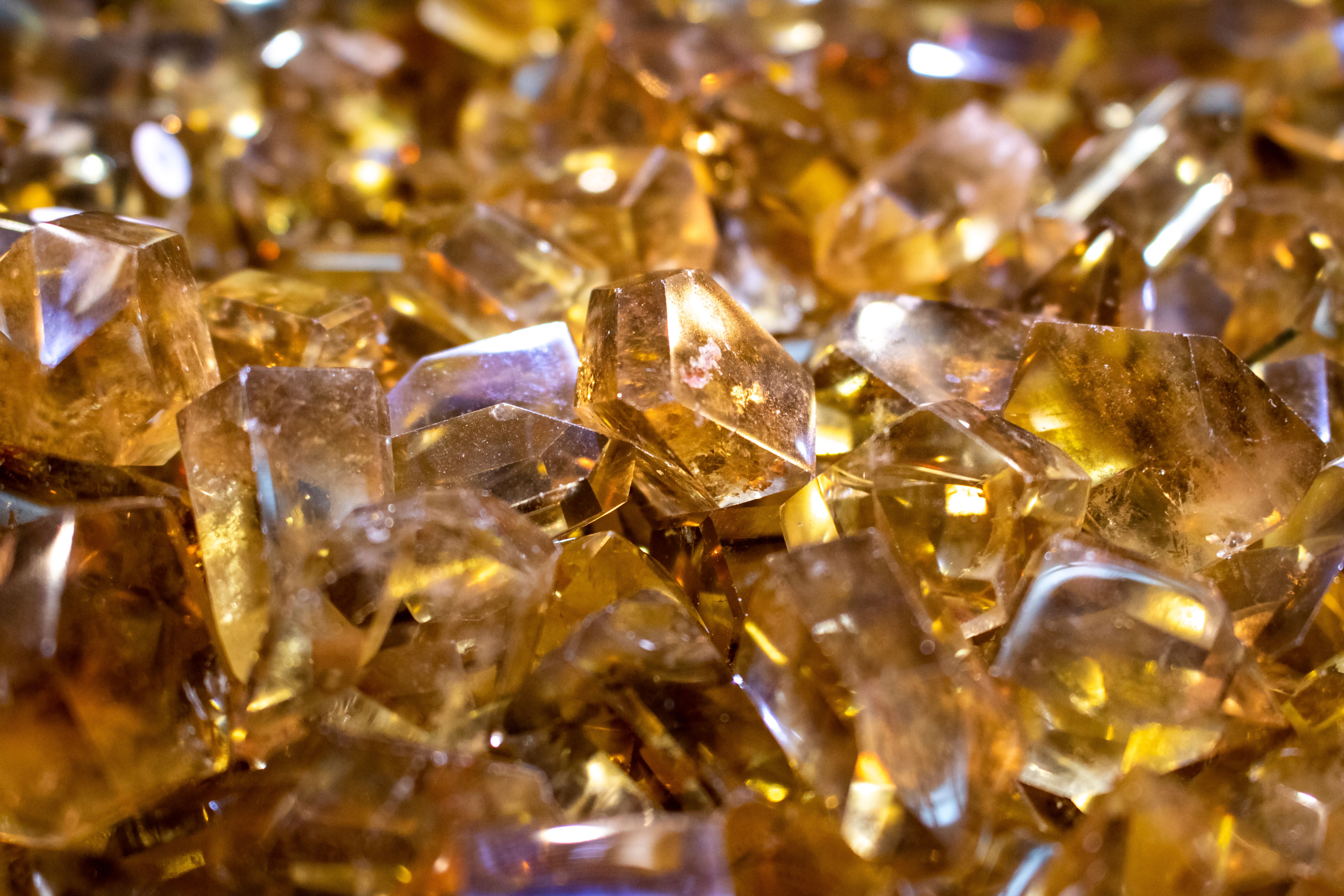 Polished golden yellow citrine crystals, the classic stones used to strengthen and balance the solar plexus chakra
