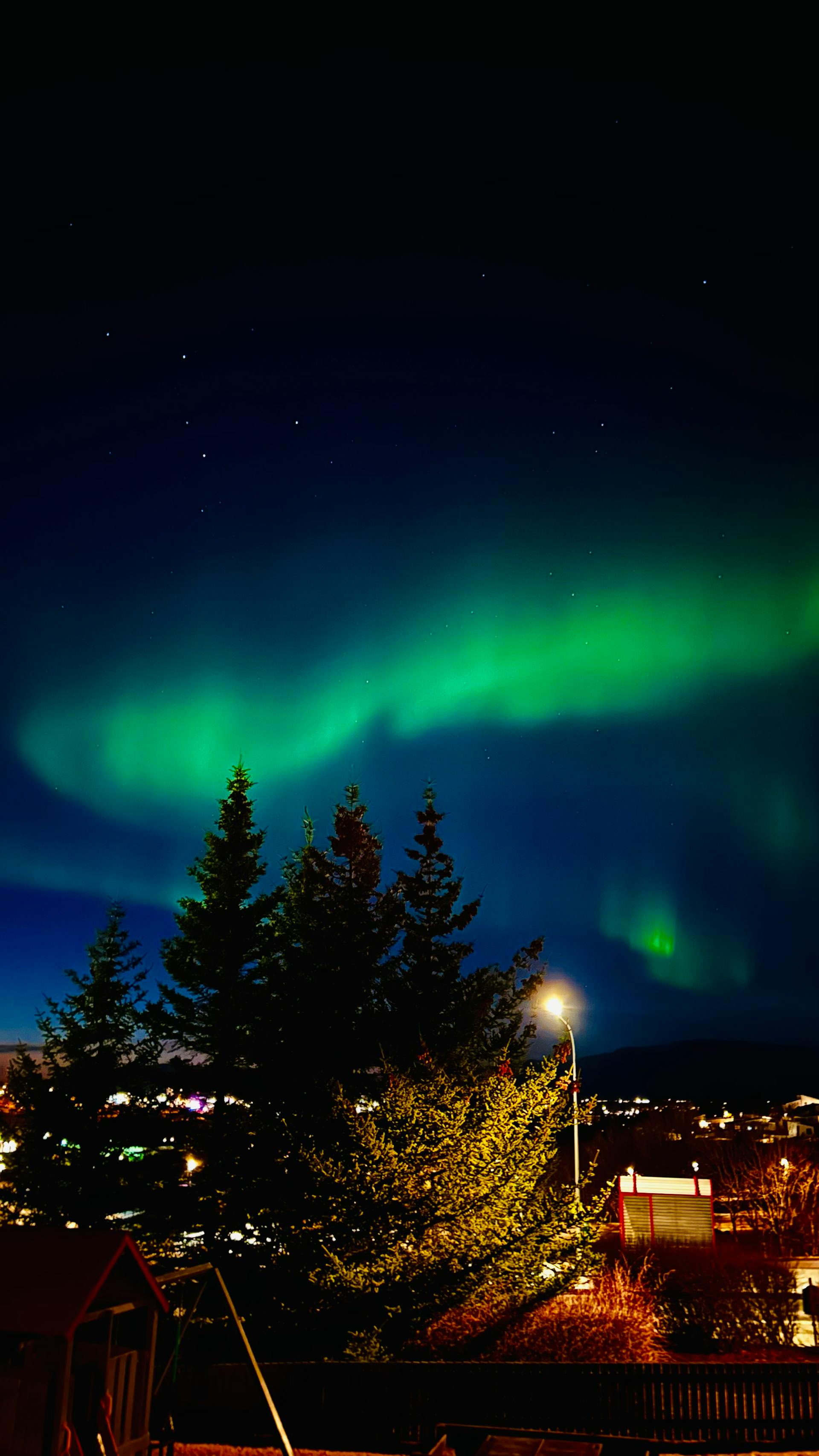 Beautiful northern lights illuminating the night sky capturing the otherworldly energy associated with Uranus in astrology