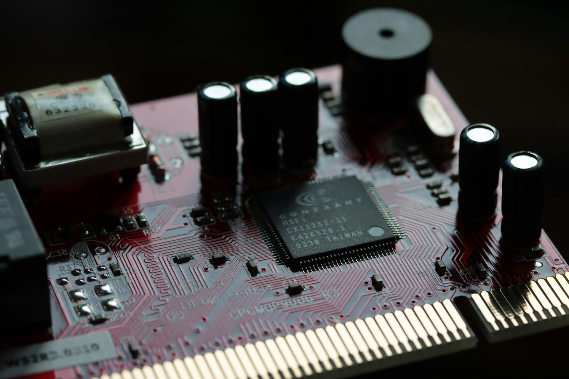 Detailed view of a circuit board with electronic components representing Uranus connection to technology and innovation