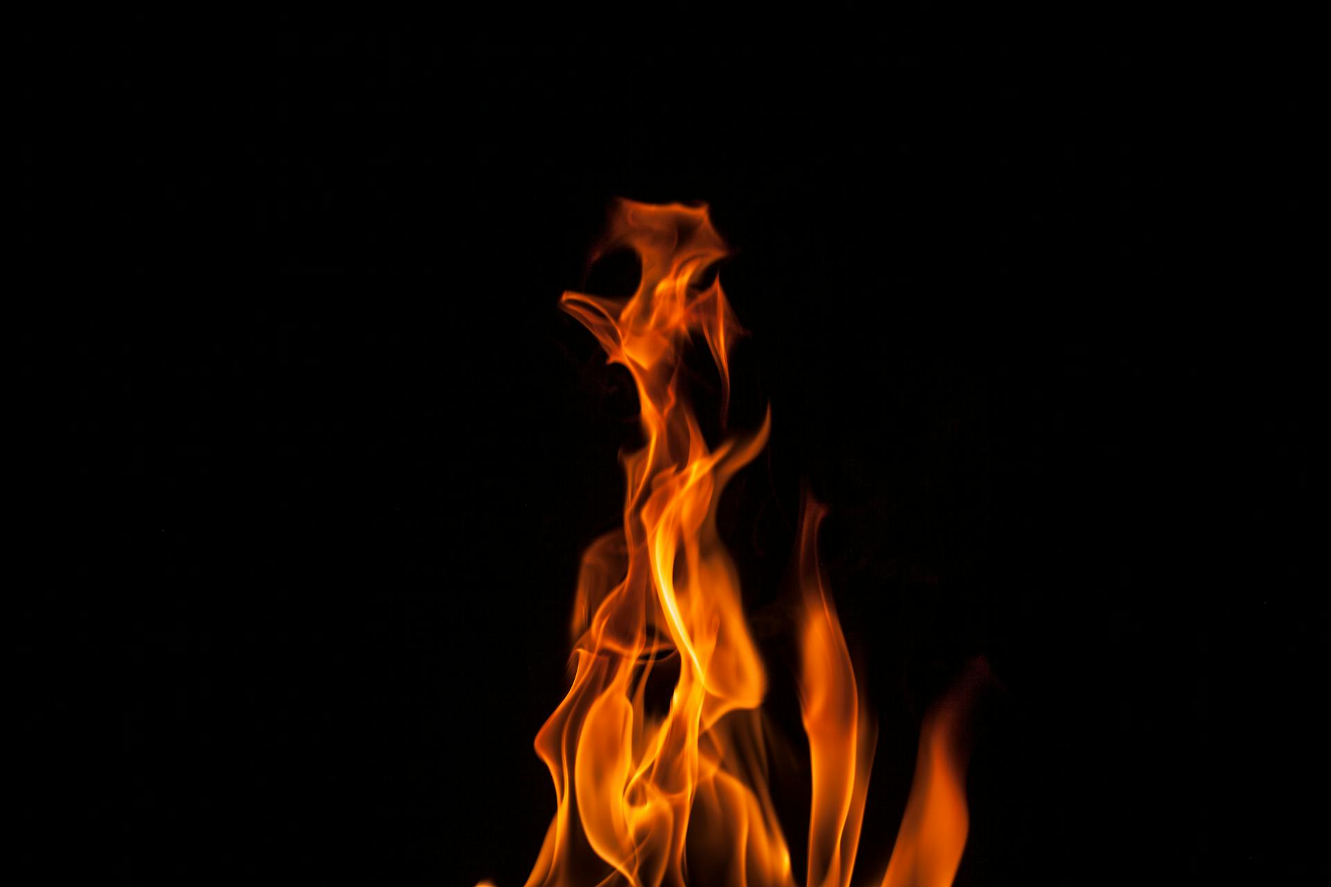 Vibrant flames burning against a dark background